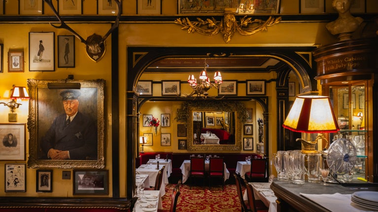 Paintings, drawings and caricatures adorn the walls at Rules Restaurant